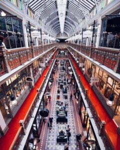 a large room with many rows of red machines